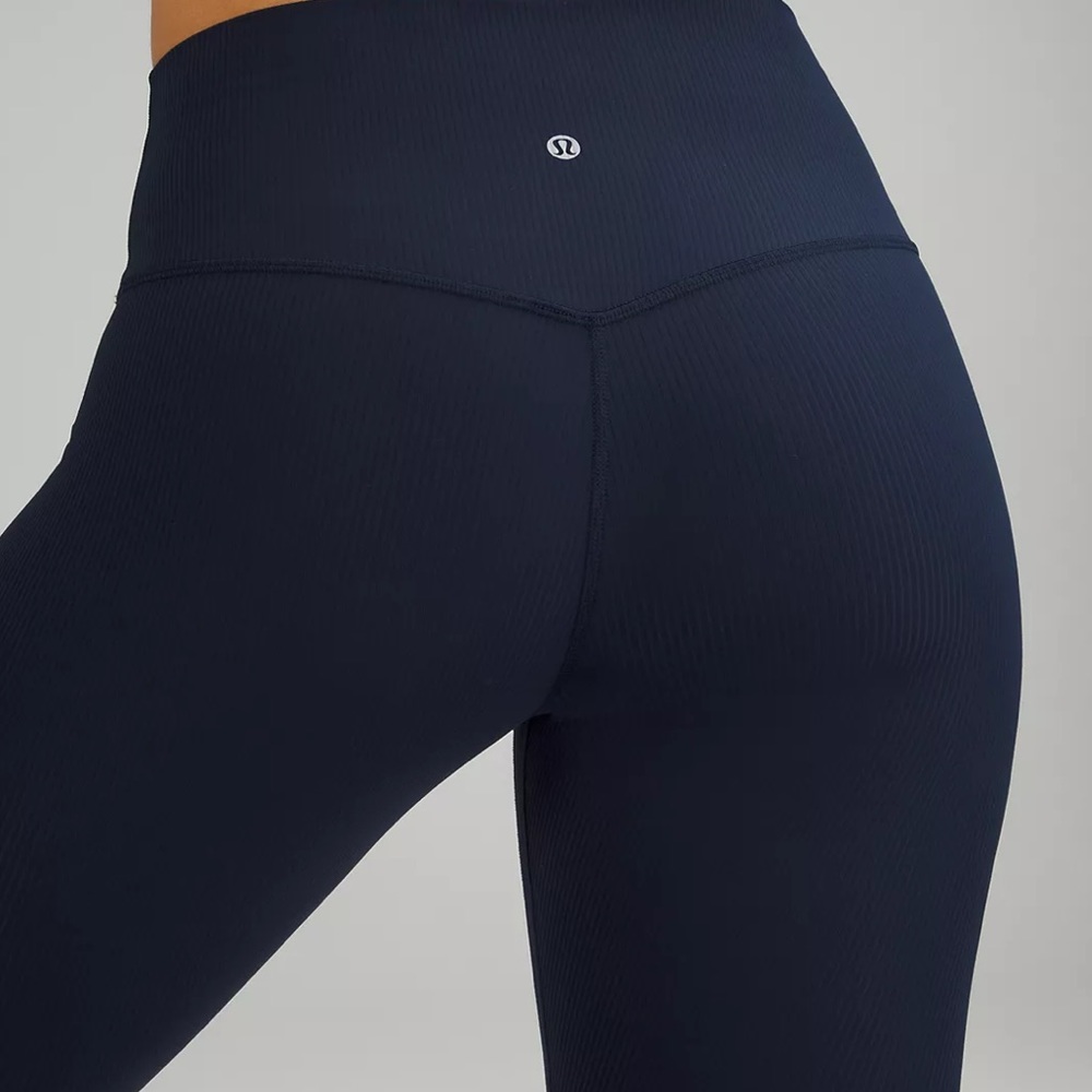 Lululemon 7/8 navy blue leggings. Worn once ! Size 2